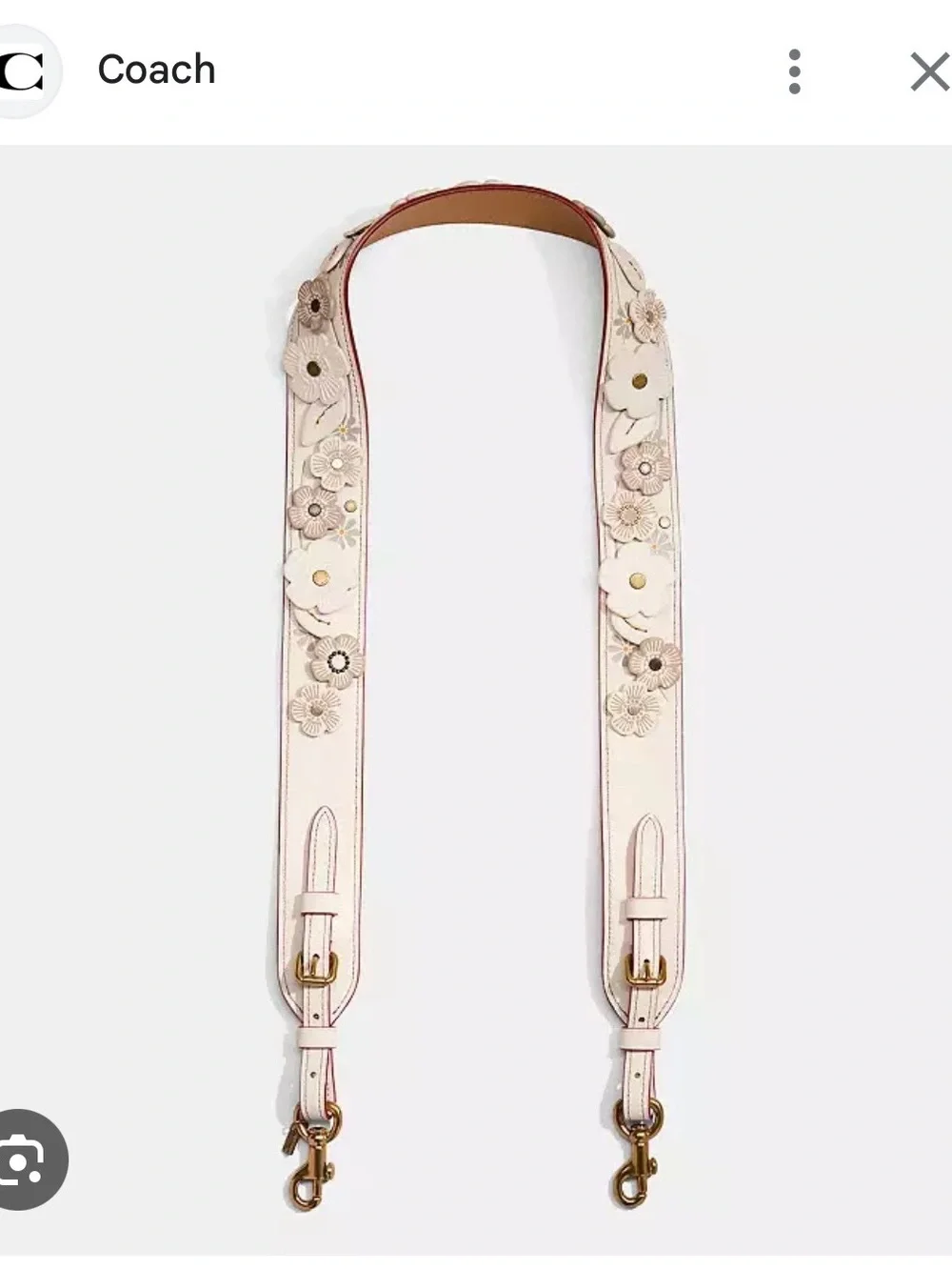 Coach Novelty Cream Floral Applique Leather Strap with Gold and Silver Hardware.